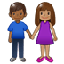 👩🏽‍🤝‍👨🏾 woman and man holding hands: medium skin tone, medium-dark skin tone display on Samsung